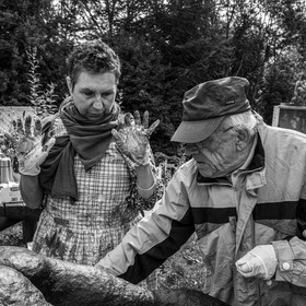 Création de l'homme de l'Ouort Marcel Joli Coeur : pose d'un enduit noir